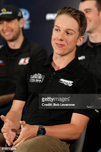 John Hunter Nemechek shares a laugh with the media during the 2017 NASCAR Camping World Truck Series Playoffs Media Day on September 20, 2017 in...