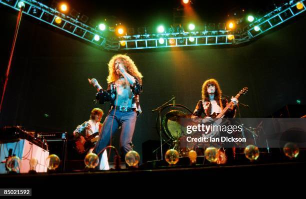 Photo of LED ZEPPELIN, L-R: John Paul Jones, Robert Plant, Jimmy Page performing live onstage