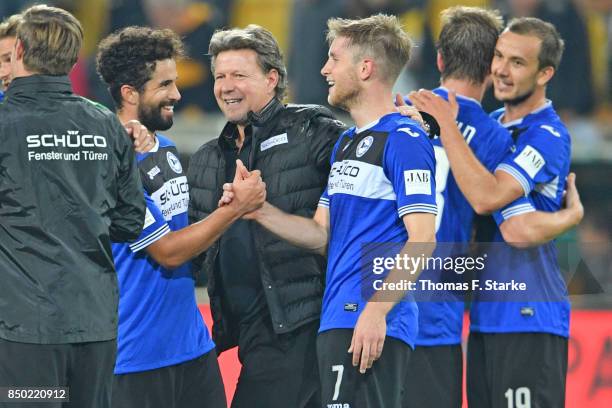 Nils Teixeira, coach Jeff Saibene, Patrick Weihrauch, Julian Boerner and Manuel Prietl of Bielefeld celebrate after winning the Second Bundesliga...