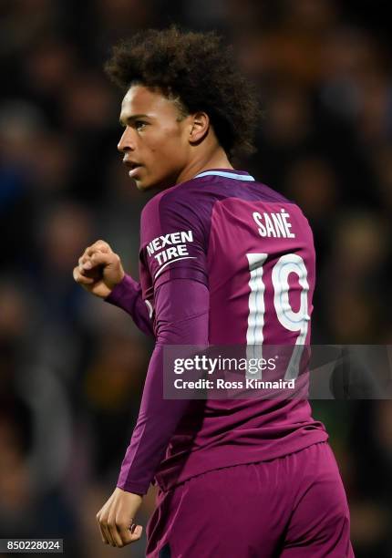 Leroy Sane of Manchester City celebrates scoring his sides first goal during the Carabao Cup Third Round match between West Bromwich Albion and...