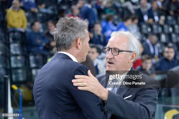 Head coach of Torino FC Sinisa Mihajlovic hugs Head coach of Udinese Luigi Del Neri before the Serie A match between Udinese Calcio and Torino FC at...