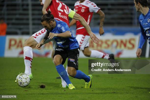 Pontus Silfwer of Halmstad BK and Romario Pereira Sipiao of Kalmar FF compete for the ball at Orjans Vall on September 20, 2017 in Halmstad, Sweden.