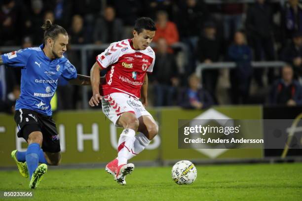 Pontus Silfwer of Halmstad BK and Romario Pereira Sipiao of Kalmar FF compete for the ball at Orjans Vall on September 20, 2017 in Halmstad, Sweden.