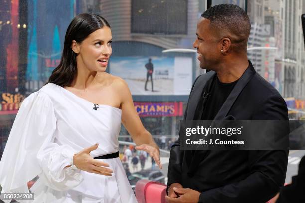 Model Adriana Lima is interviewed by A. J. Calloway during her visit to 'Extra' at their New York Studios at H&M Times Square on September 20, 2017...