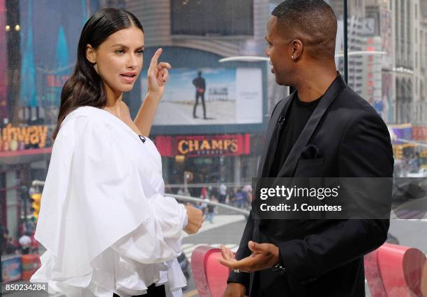 Model Adriana Lima is interviewed by A. J. Calloway during her visit to 'Extra' at their New York Studios at H&M Times Square on September 20, 2017...