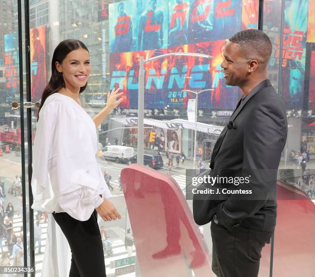 Model Adriana Lima is interviewed by A. J. Calloway during her visit to 'Extra' at their New York Studios at H&M Times Square on September 20, 2017...