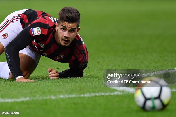 Milan's Portuguese forward Andre Silva eyes the ball during the Italian Serie A football match AC Milan vs Spal at San Siro stadium in Milan on...