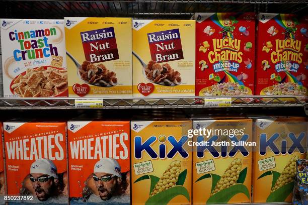 Boxes of General Mills brand cereals are displayed at Scotty's Market on September 20, 2017 in San Rafael, California. General Mills reported a lower...
