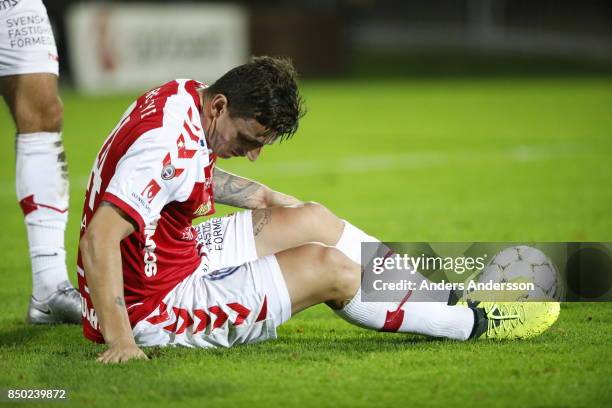 Erton Fejzullahu of Kalmar FF sits on the ground after a tackle at Orjans Vall on September 20, 2017 in Halmstad, Sweden.