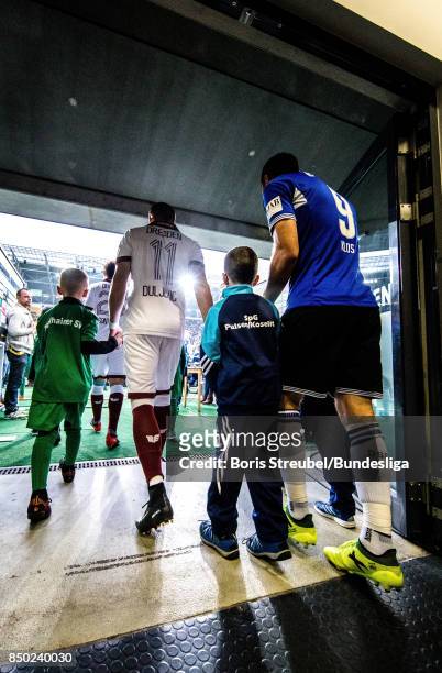 Players of Dresden and Bielefeld arrive in the tunnel and enter the pitch for the second half during the Second Bundesliga match between SG Dynamo...