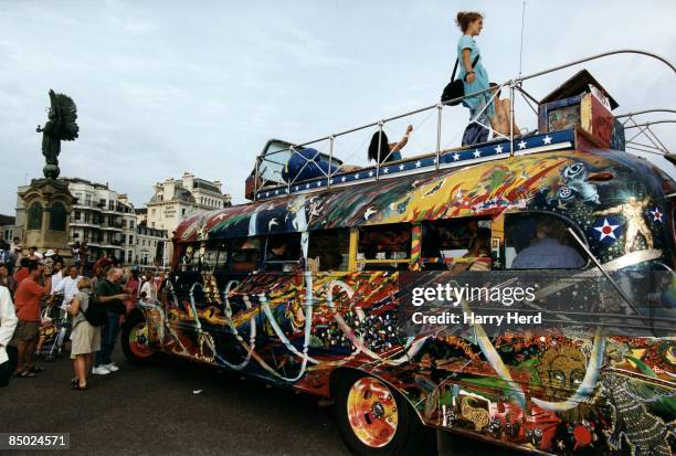 Photo of Ken KESEY; Further pulls up at the peace statue, Brighton as the crowds gather to meet Ken Kesey & the Merry Pranksters