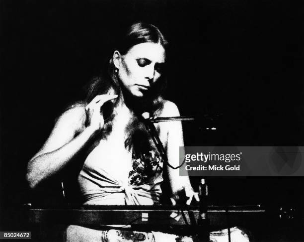 Canadian-American singer-songwriter Joni Mitchell performing at the New Victoria Theatre, London, April 21, 1974.