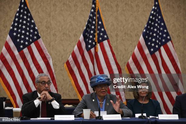 Rep. Alma Adams speaks as House Minority Leader Rep. Nancy Pelosi and Rep. Bobby Scott listen during a roundtable discussion September 20, 2017 on...