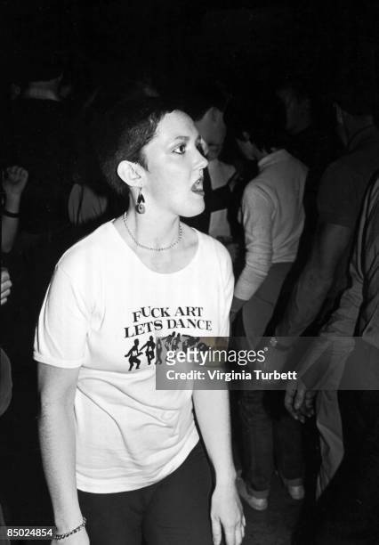 Jo Wallace wears a t-shirt reading 'Fuck Art Let's Dance' while dancing to ska, 2-tone and soul music at the 6Ts Rhythm and Soul Night held at The...