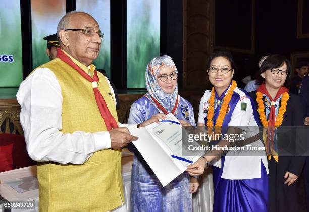 Prof. Kaptan Singh Solanki, Governor of Haryana , along with Crown Princess Tunku Azizah of Pahang, Malaysia , on the occasion of 40 members of...