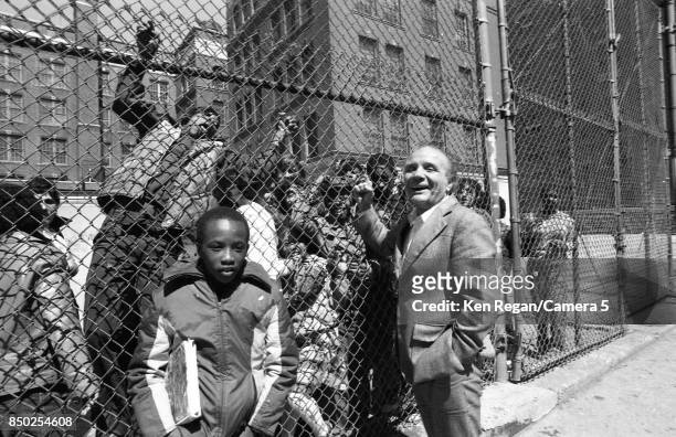 Boxer Jake LaMotta is photographed in April 1981 visiting his old neighborhood in Bronx, New York. CREDIT MUST READ: Ken Regan/Camera 5 via Contour...