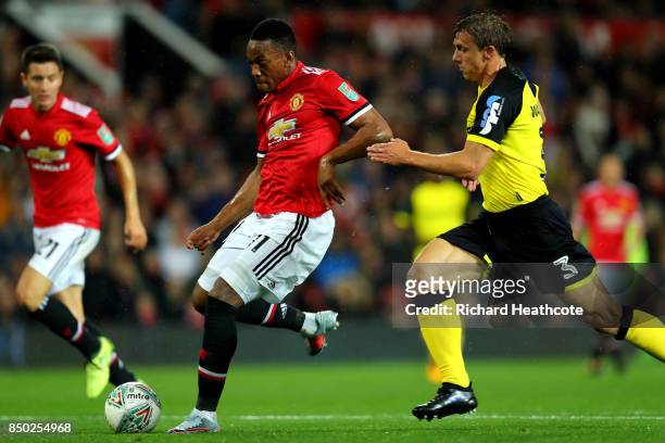 Anthony Martial of Manchester United scores his sides fourth goal during the Carabao Cup Third Round match between Manchester United and Burton...
