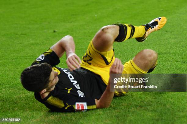 Christian Pulisic of Dortmund celebrates after he scored his teams third goal to make it 3:0 during the Bundesliga match between Hamburger SV and...