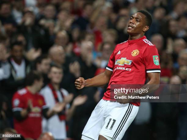 Anthony Martial of Manchester United celebrates scoring their fourth goal during the Carabao Cup Third Round between Manchester United and Burton...