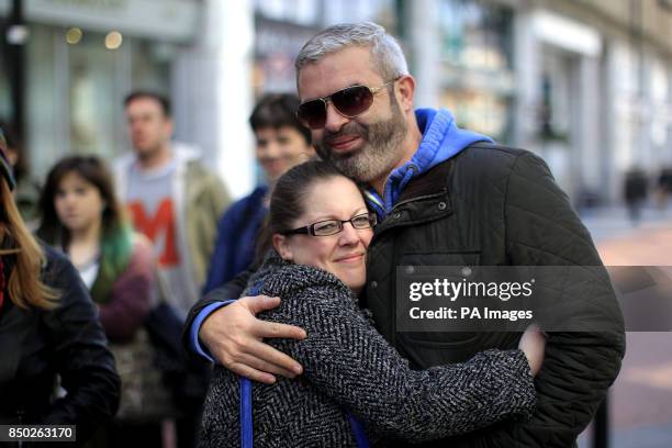 Aoife Wynn hugs her friend Buzz O'Neill who was attacked in Dublin recently, outside the Gaeity Theatre in Dublin, at a photocall to coincide with...