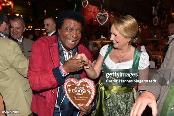 Roberto Blanco and Martina Dingler attend the Radio Gong 96.3 Wiesn during the Oktoberfest 2017 on September 20, 2017 in Munich, Germany.