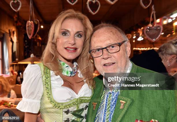 Joseph Vilsmaier and his partner Birgit Muth attend the Radio Gong 96.3 Wiesn during the Oktoberfest 2017 on September 20, 2017 in Munich, Germany.