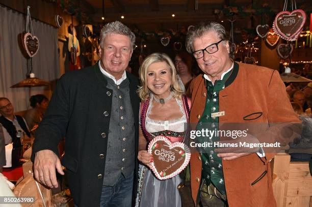 Dieter Reiter, Marianne Hartl and Michael Hartl attend the Radio Gong 96.3 Wiesn during the Oktoberfest 2017 on September 20, 2017 in Munich, Germany.