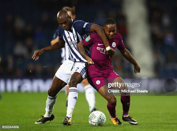 Allan Nyom of West Bromwich Albion and Raheem Sterling of Manchester City battle for possession during the Carabao Cup Third Round match between West...