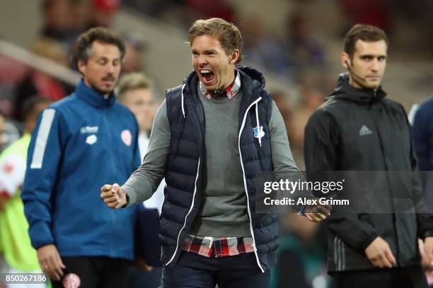 Head coach Julian Nagelsmann of Hoffenheim celebrates after the final whistle of the Bundesliga match between 1. FSV Mainz 05 and TSG 1899 Hoffenheim...