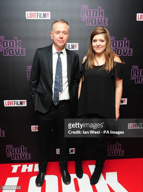 Michael Winterbottom and guest arriving for the UK premiere of The Look of Love at the Curzon Soho, London
