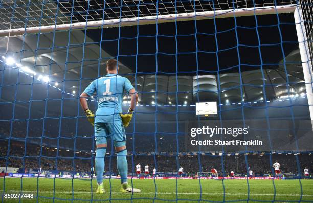 Christian Mathenia of Hamburg stands after Christian Pulisic of Dortmund scored Dortmunds third goal to make it 3:0 during the Bundesliga match...