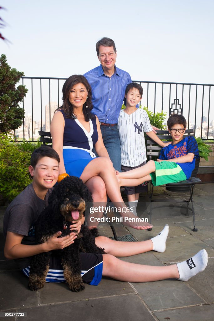 Journalist Juju Chang is photographed with husband Neal Shapiro, sons
