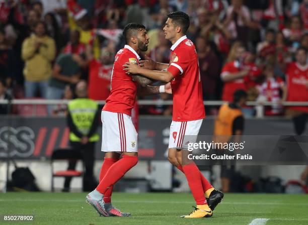 Benfica forward Raul Jimenez from Mexico celebrates with teammate SL Benfica forward Gabriel Barbosa from Brazil after scoring a goal during the...