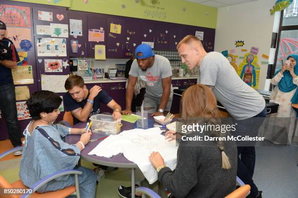 New England Revolution Kelyn Rowe, Claude Dielna, and Cody Cropper send time with Mohammed at Boston Children's Hospital September 20, 2017 in...