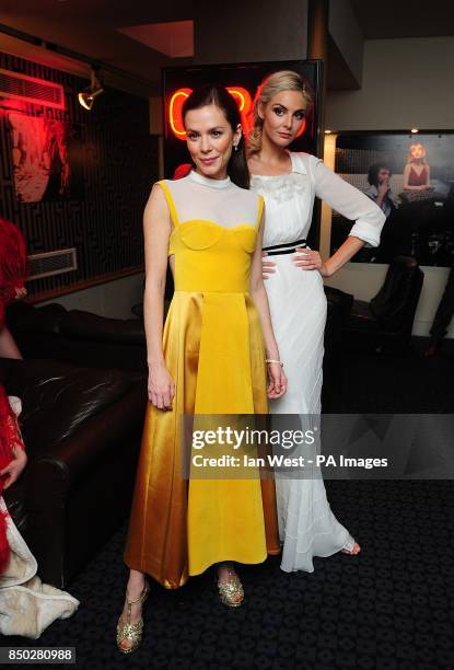 Anna Friel and Tamsin Egerton arriving for the UK premiere of The Look of Love at the Curzon Soho, London