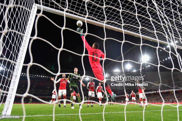 David Ospina of Arsenal dives to make a save during the Carabao Cup Third Round match between Arsenal and Doncaster Rovers at Emirates Stadium on...