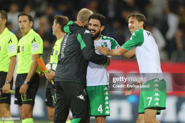 Sassuolo's coach Cristian Bucchi and Francesco Mangnanelli celebreates his victory during the Serie A match between Cagliari Calcio and US Sassuolo...