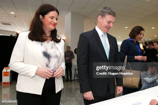 Prime Minister Bill English, wife Dr Mary English and Wellington Central candidate Nicola Willis prepare to cast their votes for the 2017 General...