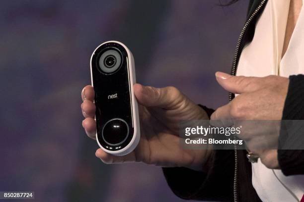 Michele Turner, general manager of security products for Nest Labs Inc., holds the Nest Hello video doorbell as she speaks during an event in San...