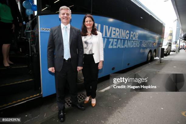 Prime Minister Bill English and Wellington Central candidate Nicola Willis pose outside the National Party campaign bus on September 21, 2017 in...