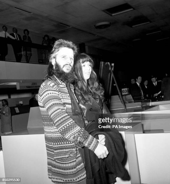 Former Beatles drummer Ringo Starr and his wife Maureen Starkey at Heathrow Airport, where they were heading to Budapest for Elizabeth Taylor's 40th...
