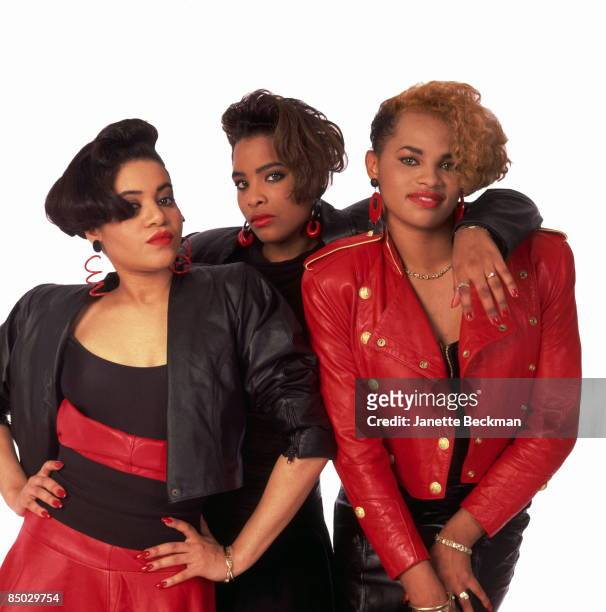 Cheryl James, Sandra Denton, and Deidra Roper of the rap group "Salt 'N Pepa" pose for a portrait in circa 1987.