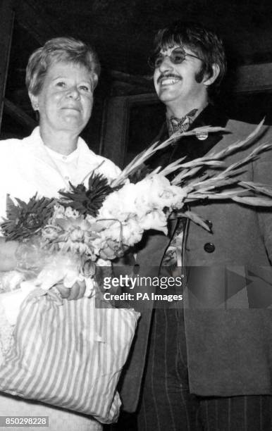 Ringo Starr of the Beatles arrives at Queen Charlotte's Hospital in London with his mother-in-law Florence Cox. He was visiting his 21-year-old wife...