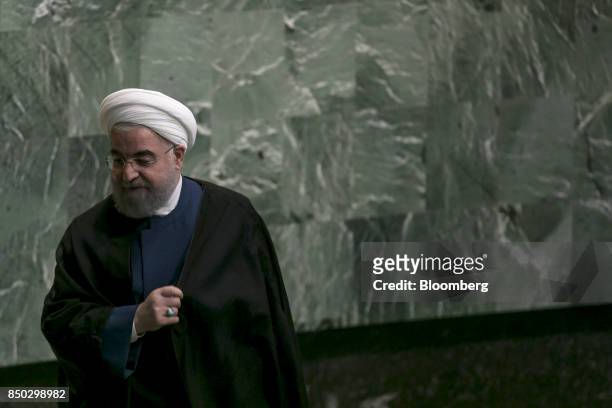 Hassan Rouhani, Iran's president, exits the podium after speaking during the UN General Assembly meeting in New York, U.S., on Wednesday, Sept. 20,...