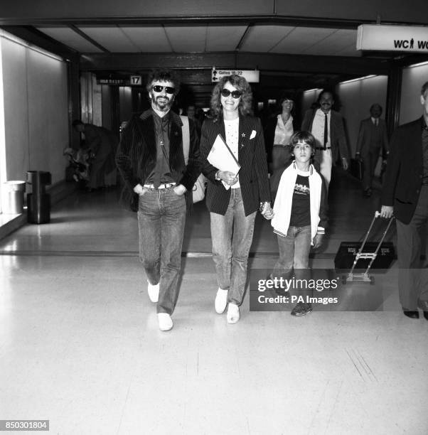 Former Beatles drummer Ringo Starr with his actress wife Barbara Bach and her son, Johnny, at Heathrow Airport in London when they returned from Los...