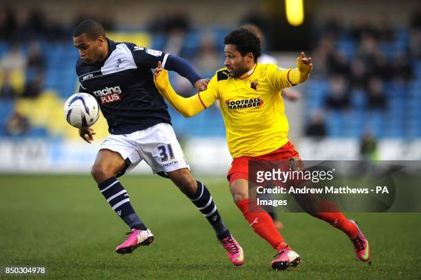 Millwall's Jermaine Easter and Watford's Ikechi Anya during the npower Football League Championship match at The Den, London.