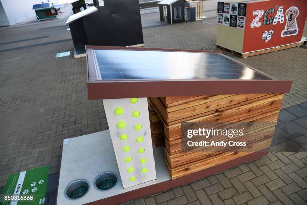 Solar dog house designed by AECOM on display for the Sustainable BARKitecture Dog House Competition at Denver International Airport September 20,...