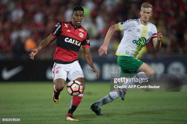 Berrio of Brazil's Flamengo vies for the ball with Douglas Grolli of Brazil's Chapecoense during their 2017 Copa Sudamericana football match at Ilha...