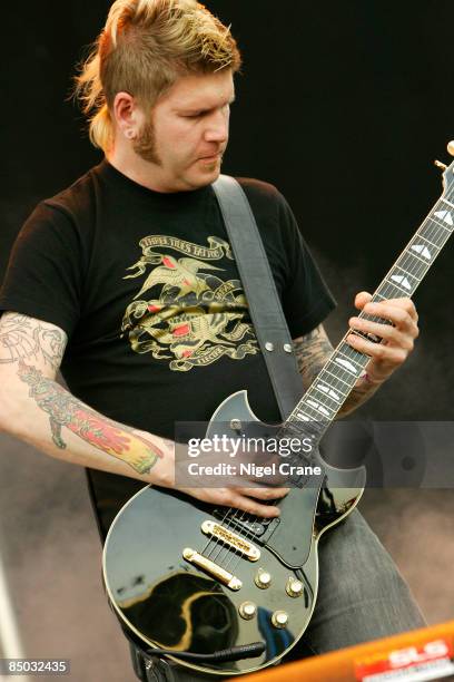 Photo of Bill KELLIHER and MASTADON and MASTODON, Bill KELLIHER playing guitar live on stage