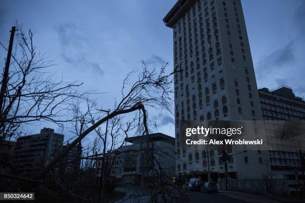 Buildings in San Juan are completely dark during a total blackout after Hurricane Maria made landfall September 20, 2017 in Puerto Rico. Thousands of...